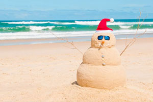 Il Natale australiano si festeggia in spiaggia con il tradizionale barbi insieme alla famiglia e agli amici